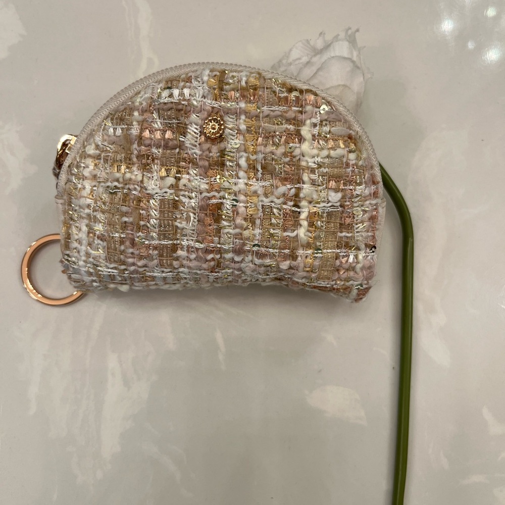 Beautiful gold and silver bag, which also works as a purse.